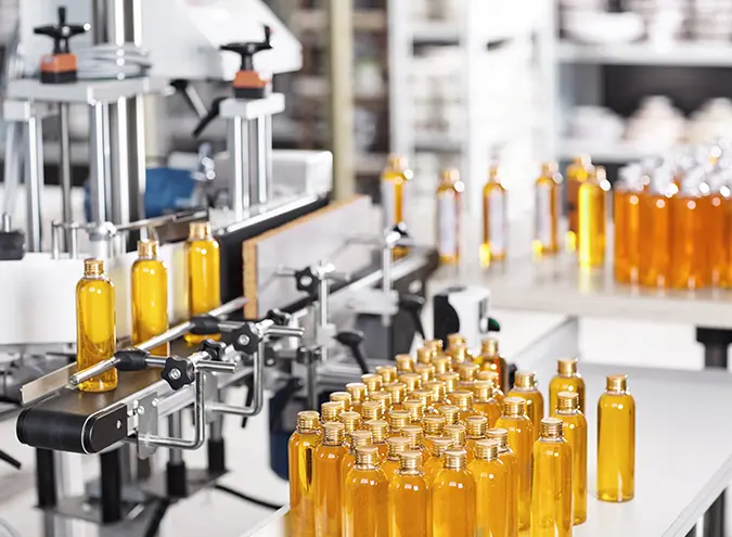 photo of natural oils production process at bottling phase na supplements