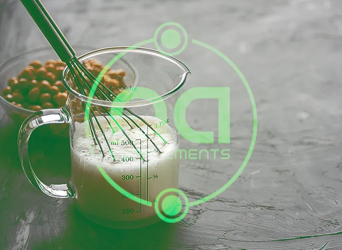 new health formulation in glass mixing cup with whisk by na supplements