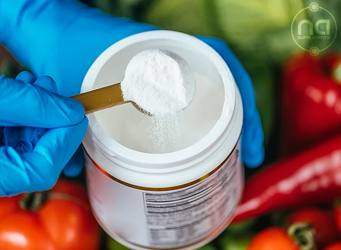 technician holding supplement product with latex gloves