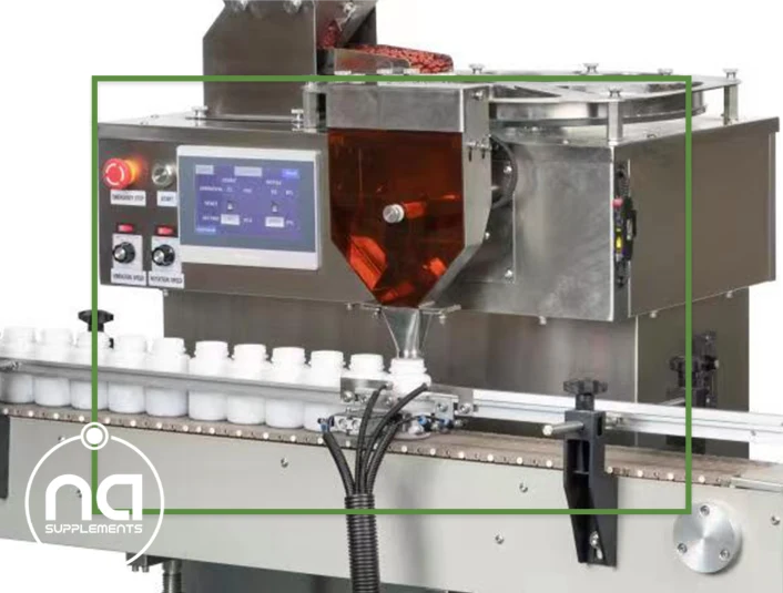 zoom in on single discharge chute on auto pill counting machine for uk companies by na supplements
