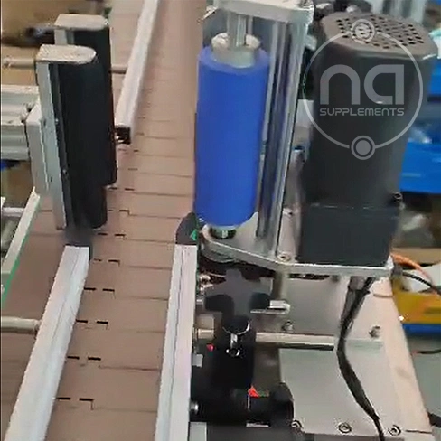 aerial view of automatic conveyor system with na supplements logo