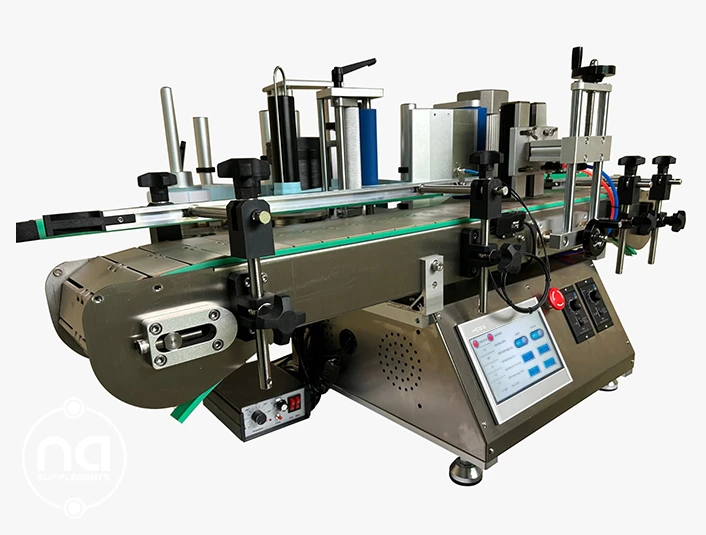 side-view of label applicator machine with conveyor belt